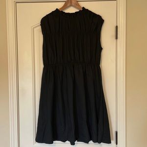 Black Ann Taylor sleeveless dress.